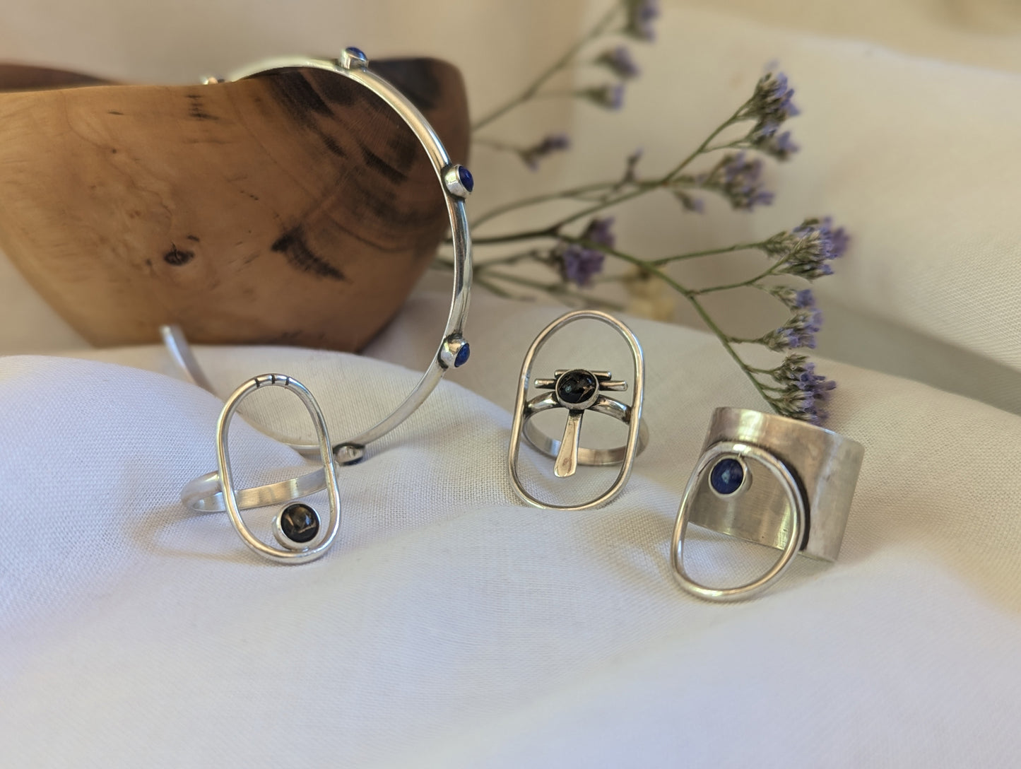 minimalist silver jewelries with lapis lazuli and copper obsidian stones. Sleek and timeless perfect faschion attitude